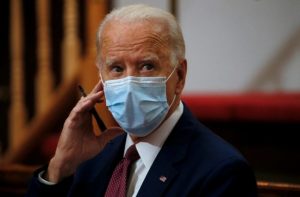 Mr. Biden ask Americans to wear masks for 100 days